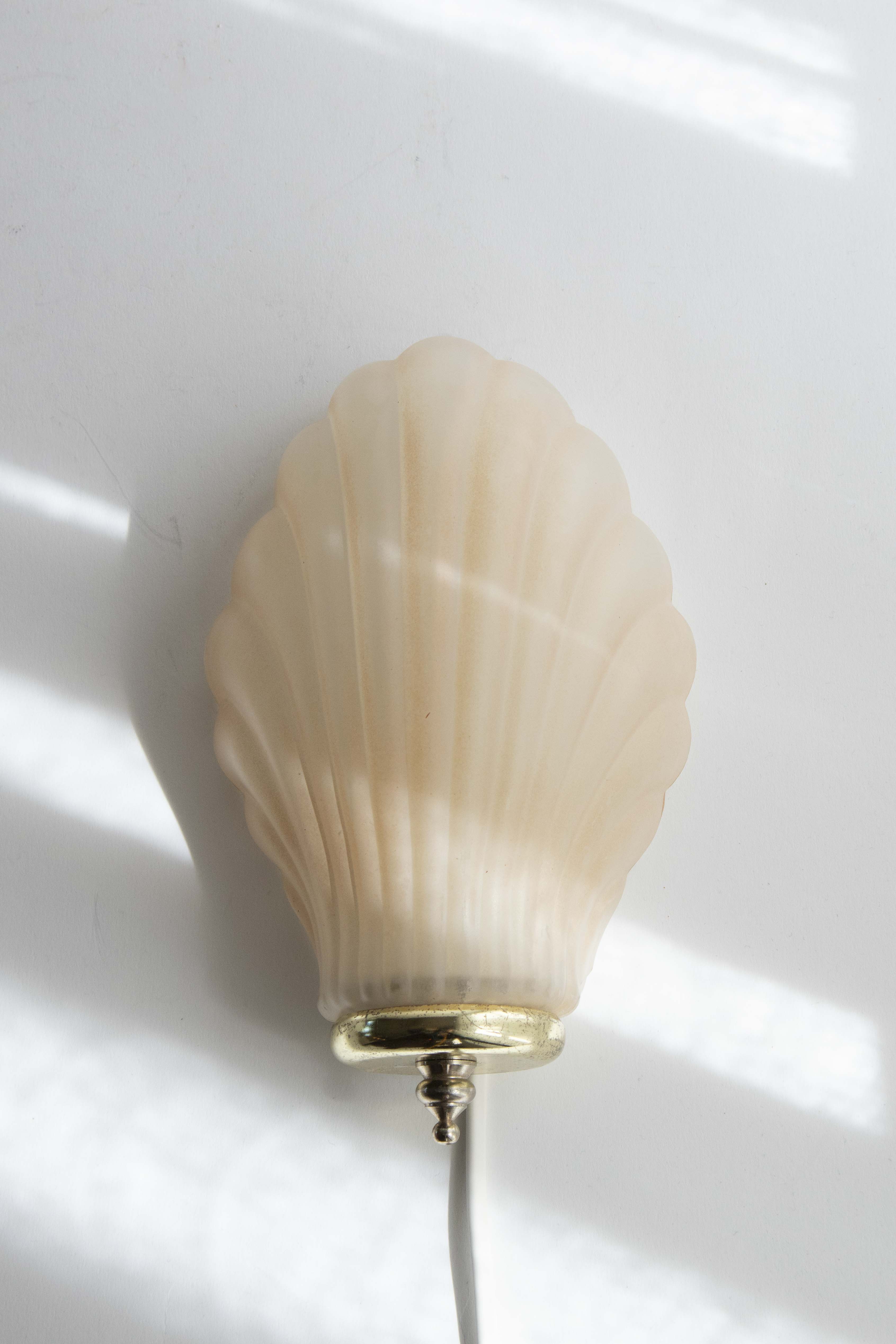 Vägglampa snäcka