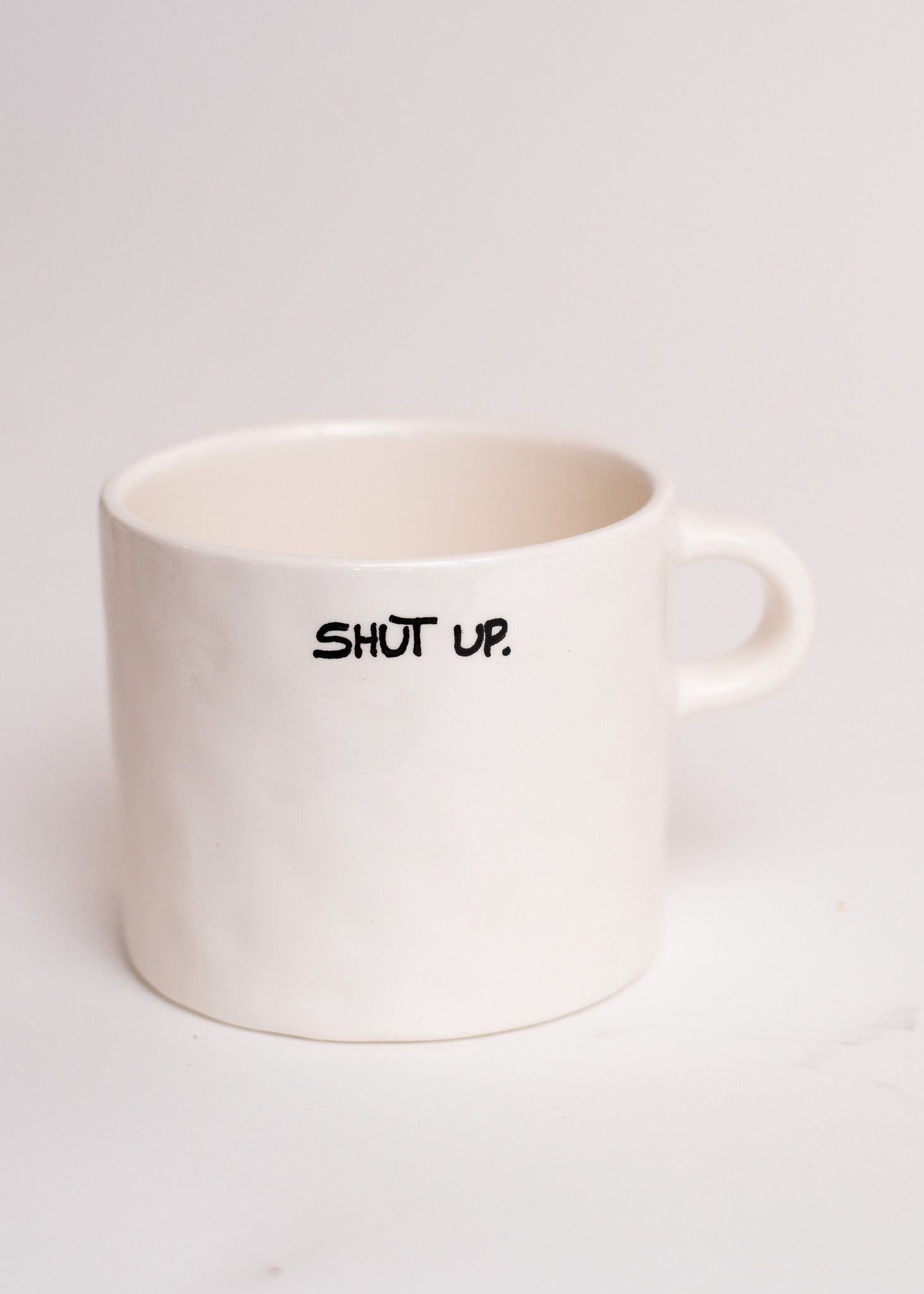 Mug Shut Up